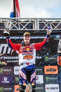 Herlings celebrates atop the MX2 podium for the fourth consecutive round. PHOTO BY JP ACEVEDO/KTM IMAGES.