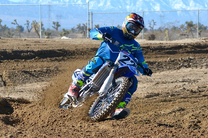 The YZ450F has a decidedly big and wide feel, and it tends to push wide off of corners, forcing the rider to make sure to get forward before initiating a turn. Its straight-line stability is excellent.